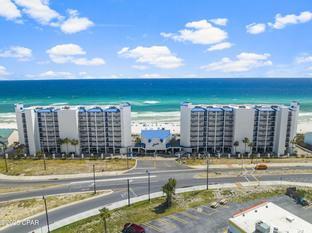 bird's eye view with a view of the beach and a water view