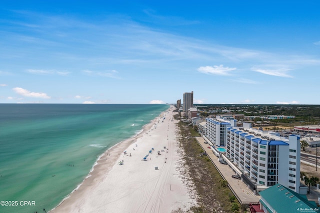 aerial view featuring a view of the beach and a water view