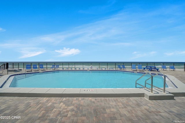 pool with a patio