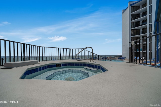 pool with a hot tub