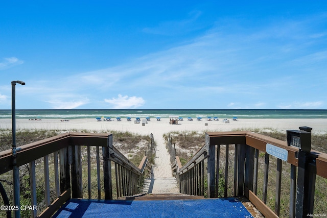 view of water feature with a beach view