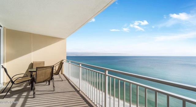 balcony featuring a water view