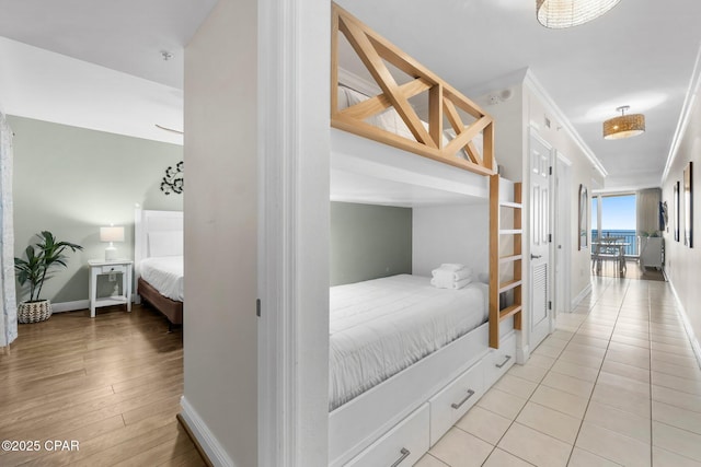 14701 Front Beach Rd Unit 1934, Panama City Beach, FL 32413 - corridor with light wood-style flooring, crown molding, and baseboards