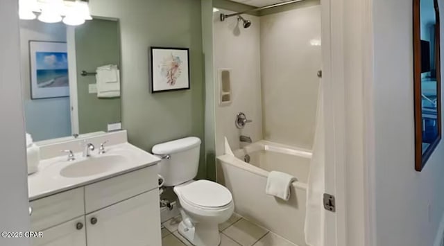 bathroom with tile patterned flooring, toilet, vanity, and shower / bath combo with shower curtain