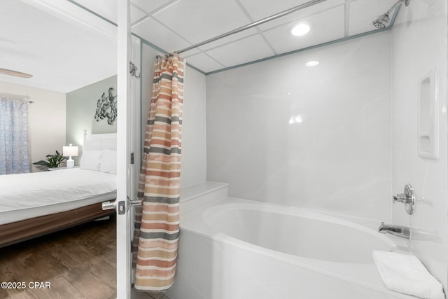 14701 Front Beach Rd Unit 1934, Panama City Beach, FL 32413 - full bathroom featuring connected bathroom, shower / tub combo, wood finished floors, and a paneled ceiling