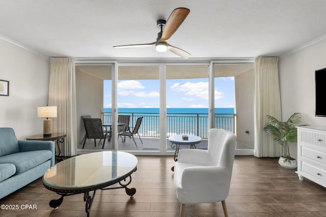 14701 Front Beach Rd Unit 1934, Panama City Beach, FL 32413 - living area featuring wood finished floors, ornamental molding, ceiling fan, and a wall of windows
