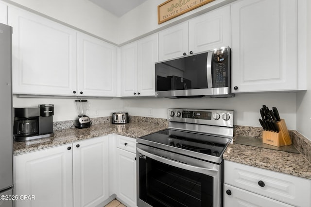 14701 Front Beach Rd Unit 1934, Panama City Beach, FL 32413 - kitchen with white cabinetry and stainless steel appliances