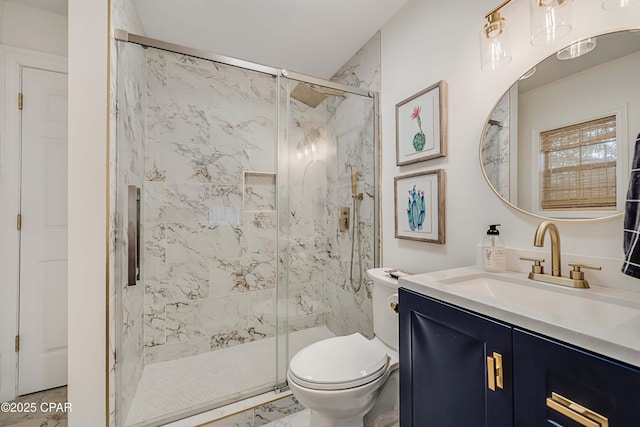 bathroom with a marble finish shower, vanity, toilet, and marble finish floor