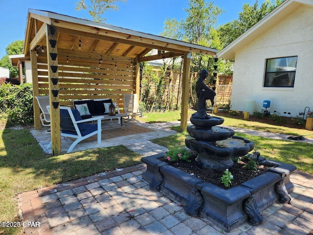 view of patio / terrace featuring fence and an outdoor hangout area