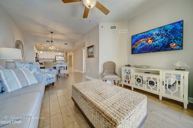 bedroom featuring light wood-style flooring and visible vents