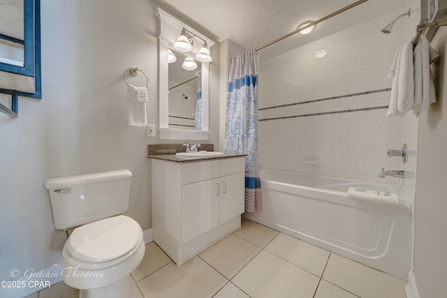 bathroom featuring toilet, vanity, shower / bath combo, tile patterned floors, and a textured ceiling