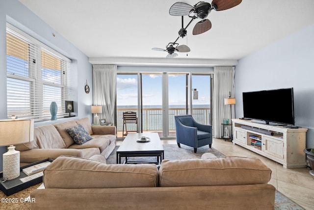 living area with ceiling fan