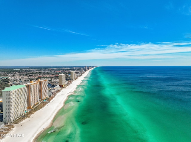 birds eye view of property featuring a water view, a view of city, and a view of the beach