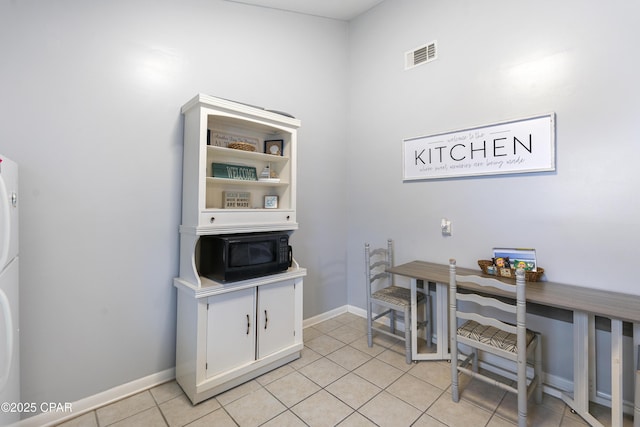 4120 Nova St Unit D, Panama City Beach, FL 32408 - office area featuring light tile patterned floors and baseboards