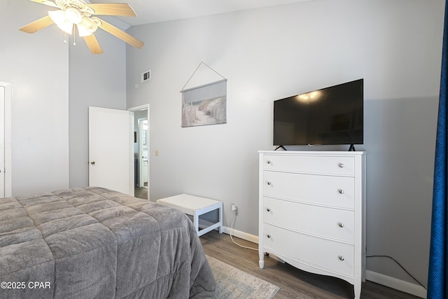 4120 Nova St Unit D, Panama City Beach, FL 32408 - bedroom with wood finished floors, high vaulted ceiling, and baseboards