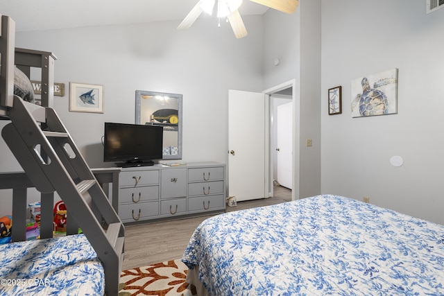 4120 Nova St Unit D, Panama City Beach, FL 32408 - bedroom with light wood-style floors and high vaulted ceiling