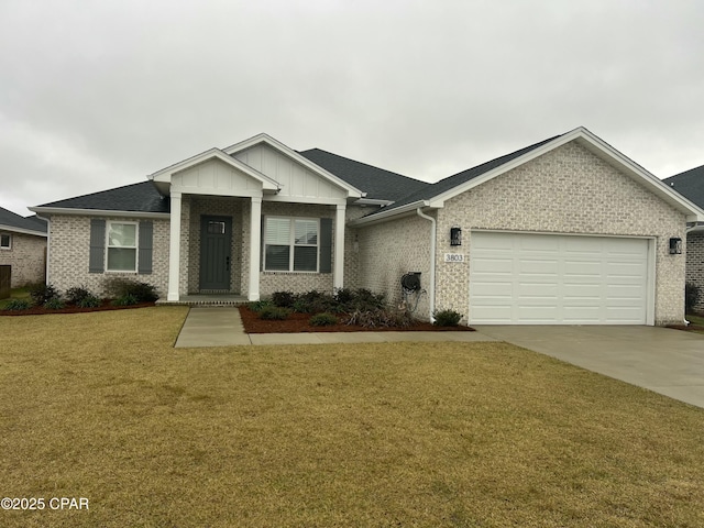 view of front of home featuring driveway, an attached garage, a front lawn, board and batten siding, and brick siding