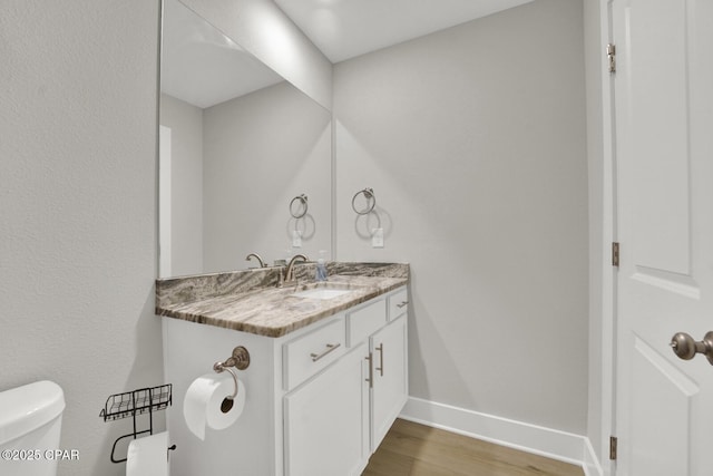 8470 Sun Point Dr, Panama City, FL 32404 - half bath featuring wood finished floors and vanity