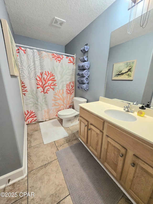 full bathroom featuring visible vents, toilet, curtained shower, a textured ceiling, and vanity