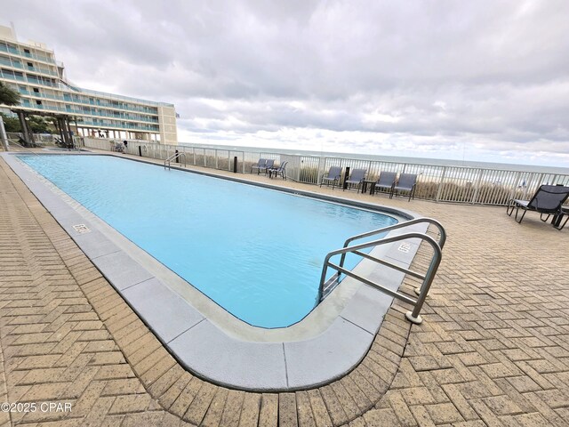 pool featuring a patio