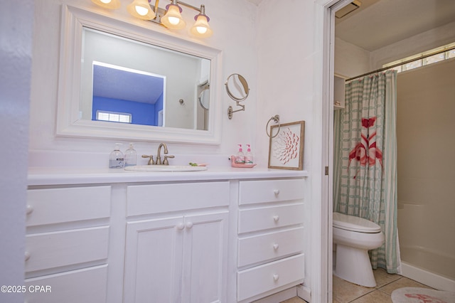 full bath featuring curtained shower, tile patterned floors, toilet, and vanity