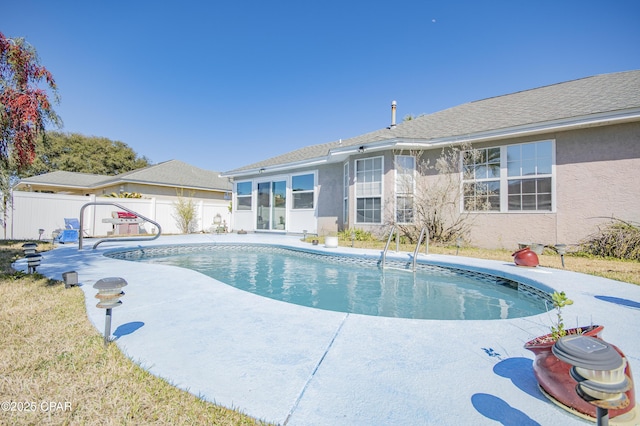 view of pool with a fenced in pool, a patio, and a fenced backyard