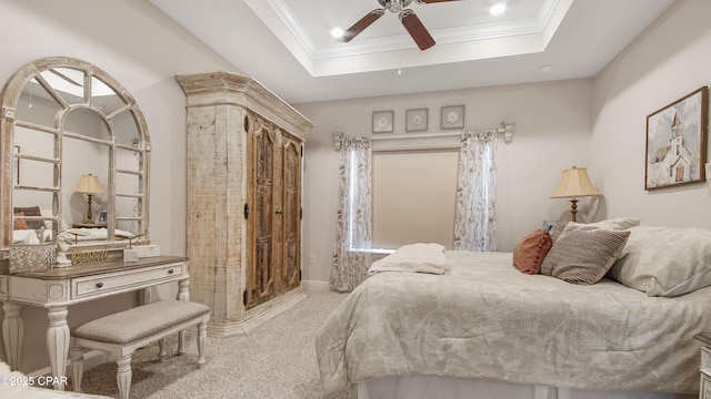 bedroom featuring carpet flooring, recessed lighting, ornamental molding, ceiling fan, and a raised ceiling