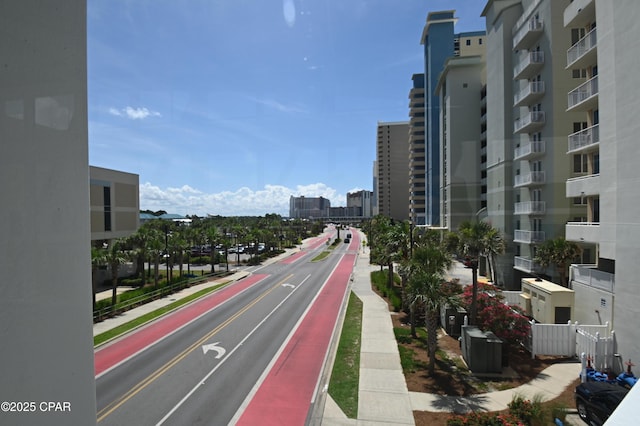 10811 Front Bch Unit 501, Panama City Beach, FL 32407 - view of asphalt street featuring sidewalks, curbs, and a view of city