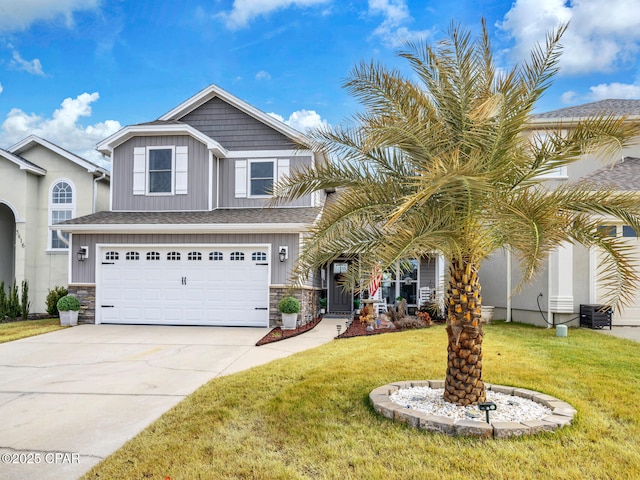 view of front facade featuring stone siding, driveway, an attached garage, and a front lawn