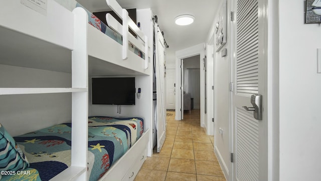 9450 S Thomas Unit 2106D, Panama City, FL 32408 - bedroom with light tile patterned floors