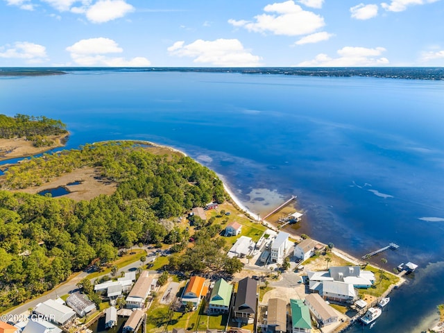 bird's eye view with a residential view and a water view