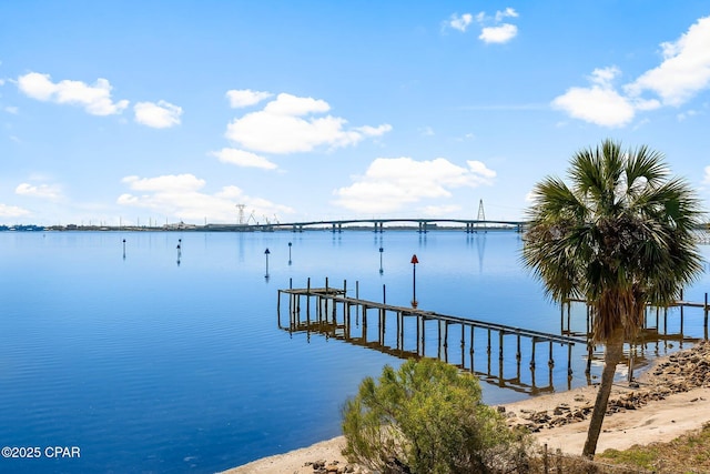 view of dock featuring a pier and a water view