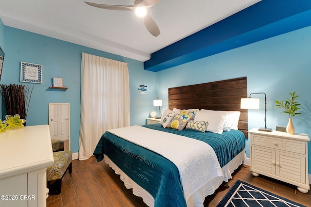 bedroom with dark wood finished floors, baseboards, and a ceiling fan