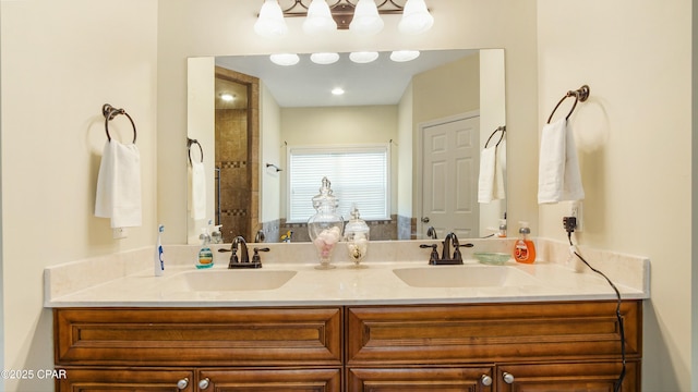 bathroom featuring a sink and double vanity