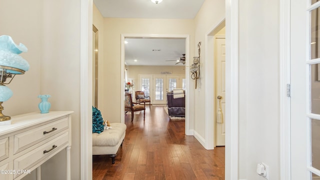 corridor with wood-type flooring