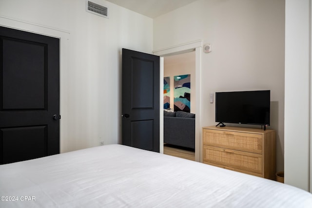 bedroom with visible vents