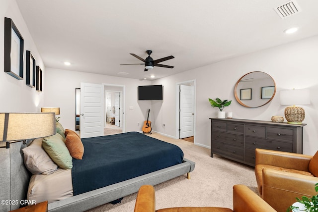 bedroom with visible vents, recessed lighting, baseboards, light colored carpet, and ceiling fan