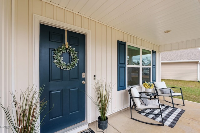 property entrance featuring a porch