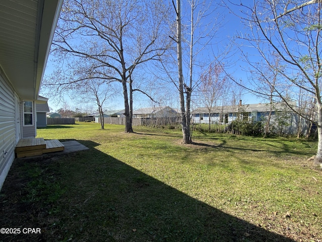 view of yard with fence