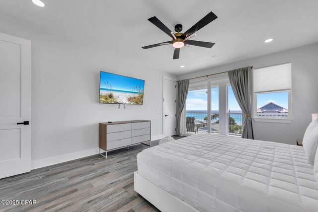 bedroom with access to exterior, wood finished floors, recessed lighting, baseboards, and ceiling fan