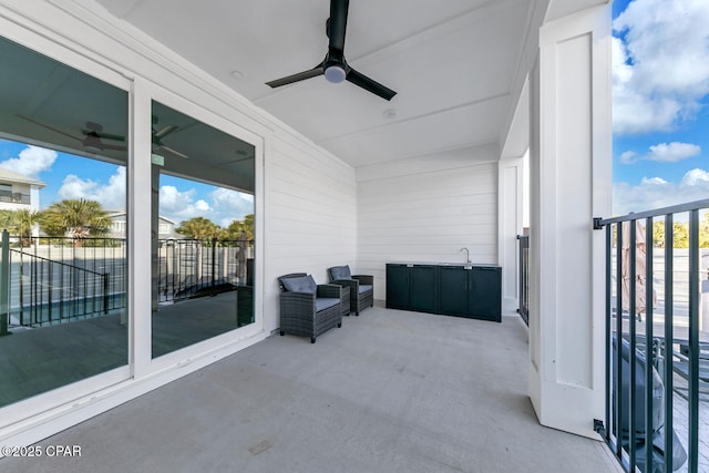 balcony with a ceiling fan