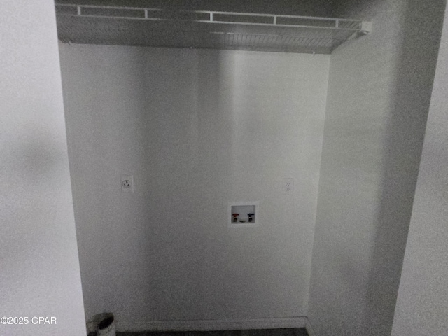 laundry room featuring laundry area, hookup for an electric dryer, and hookup for a washing machine
