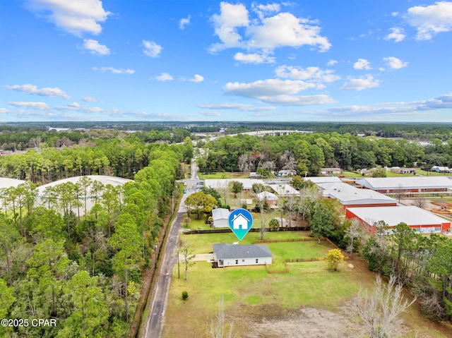 aerial view featuring a forest view