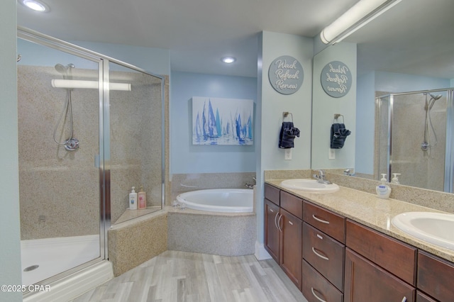 9860 S Thomas Dr Unit 1426, Panama City Beach, FL 32408 - full bath featuring a bath, a shower stall, double vanity, and recessed lighting