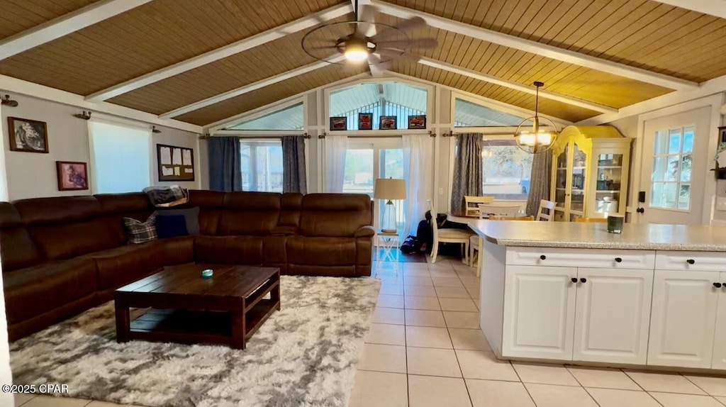 living room with light tile patterned flooring, wood ceiling, lofted ceiling with beams, and ceiling fan