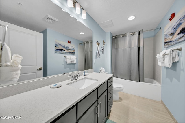 bathroom featuring visible vents, toilet, shower / bath combo, recessed lighting, and vanity