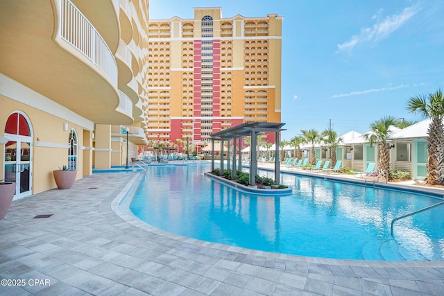 pool featuring a patio area