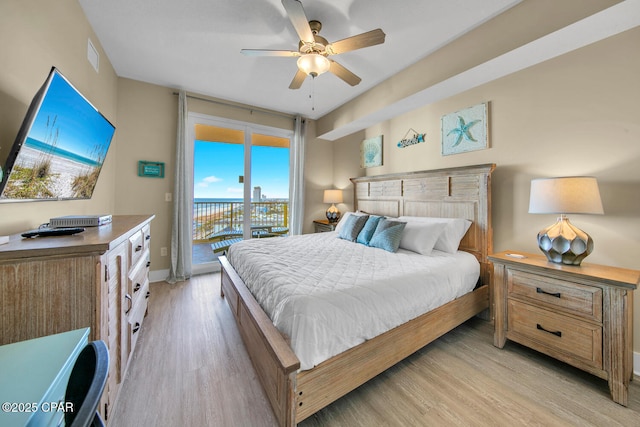 bedroom featuring a ceiling fan, visible vents, baseboards, light wood-style floors, and access to outside