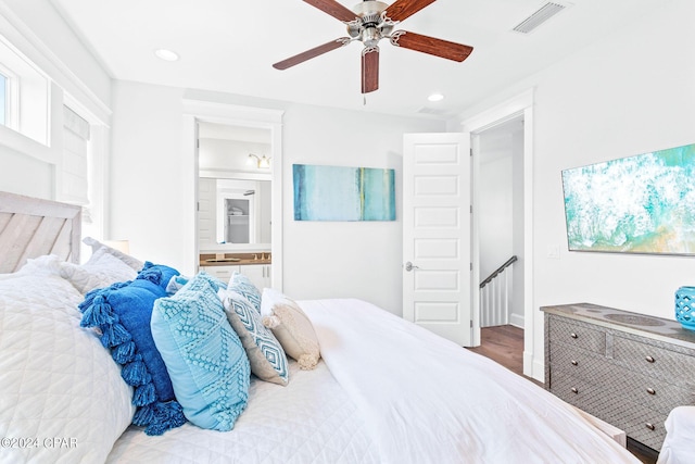 bedroom featuring ceiling fan, visible vents, ensuite bath, and recessed lighting