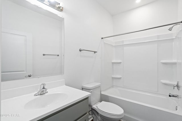 full bath featuring vanity, toilet, and tub / shower combination